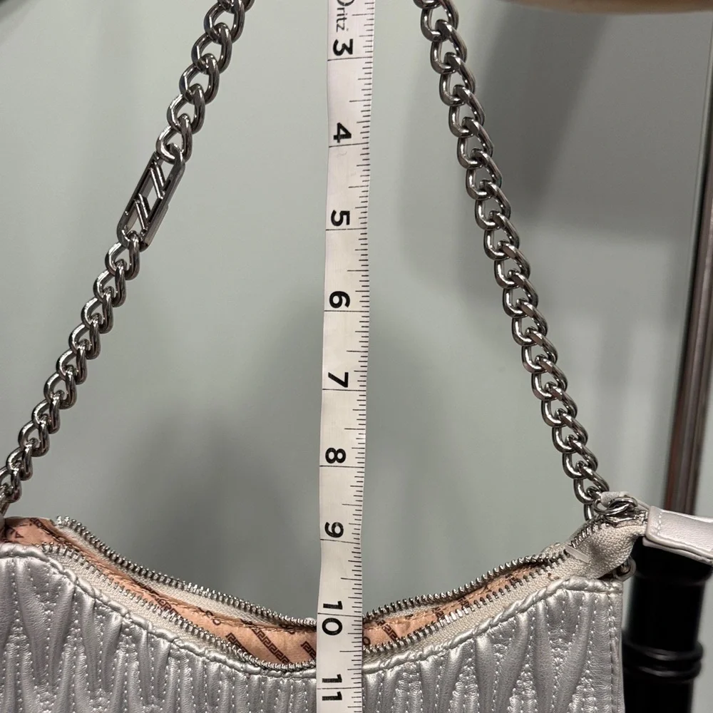 Aldo quilted silver Shoulder Bag with silver chain.